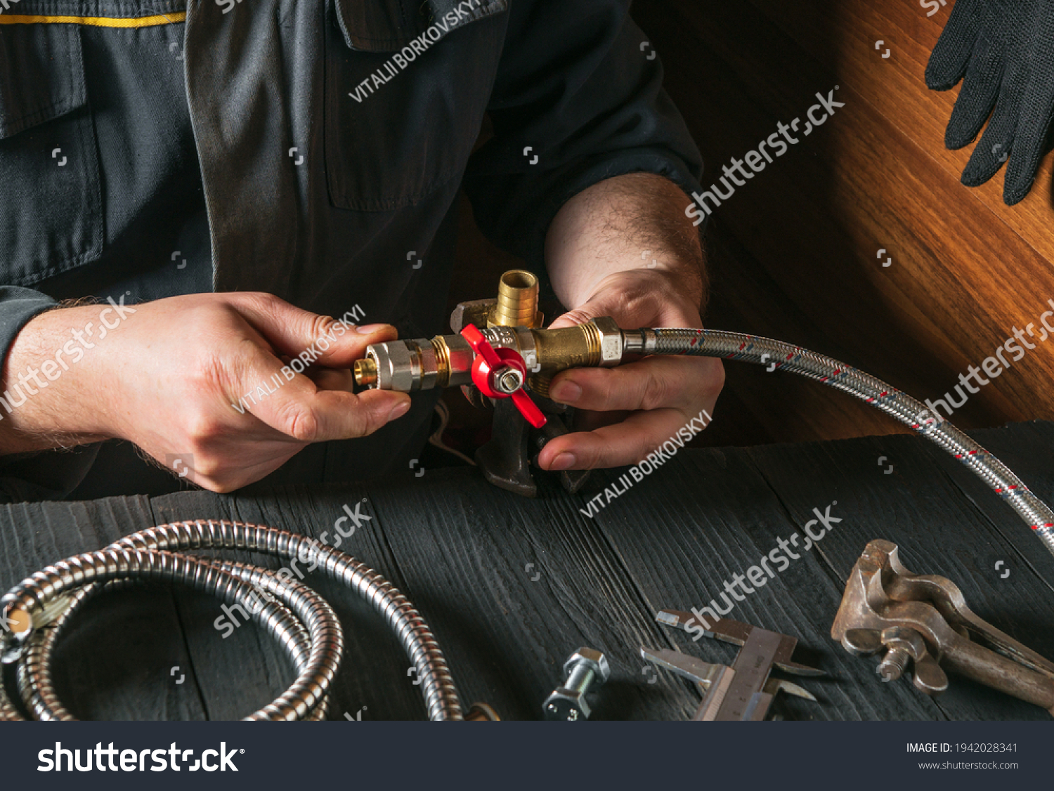 stock-photo-plumber-connects-brass-fittings-to-plumbing-tap-close-up-of-hand-of-the-master-during-work-in-1942028341 1011200 - Hose 3/8 M BSPT 5/16 F FL 1200mm