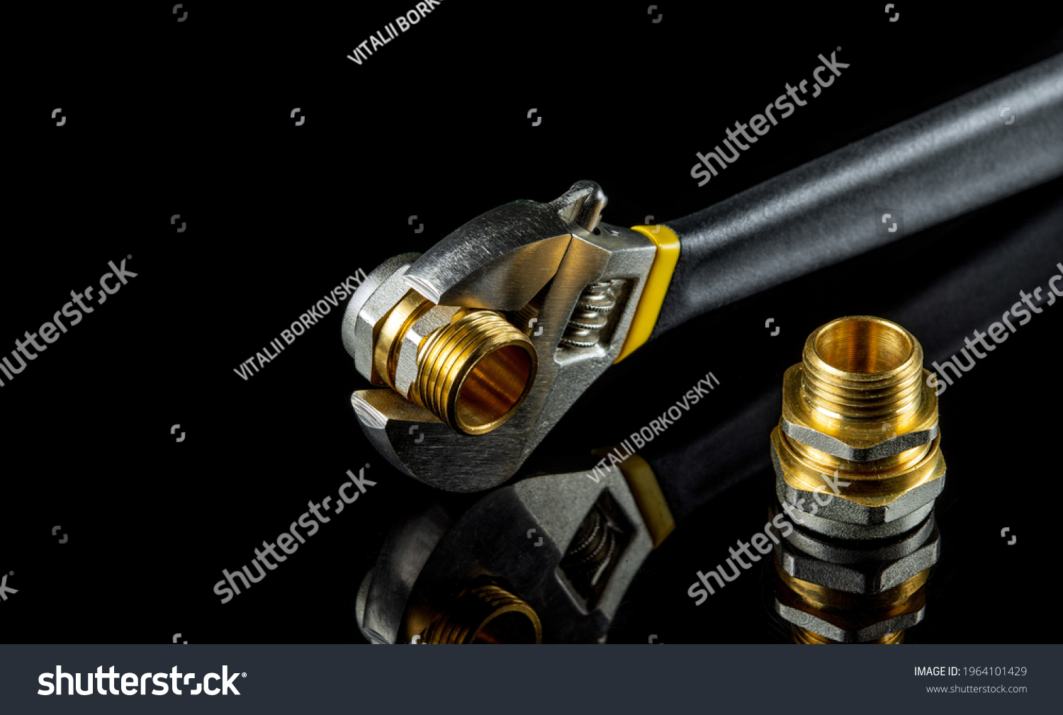 stock-photo-plumbing-brass-fittings-and-adjustable-spanner-closeup-on-black-background-during-repair-or-1964101429 38SAE14 - Union 3/8 SAE F Fl x 1/4 M BSP Coned - 9B